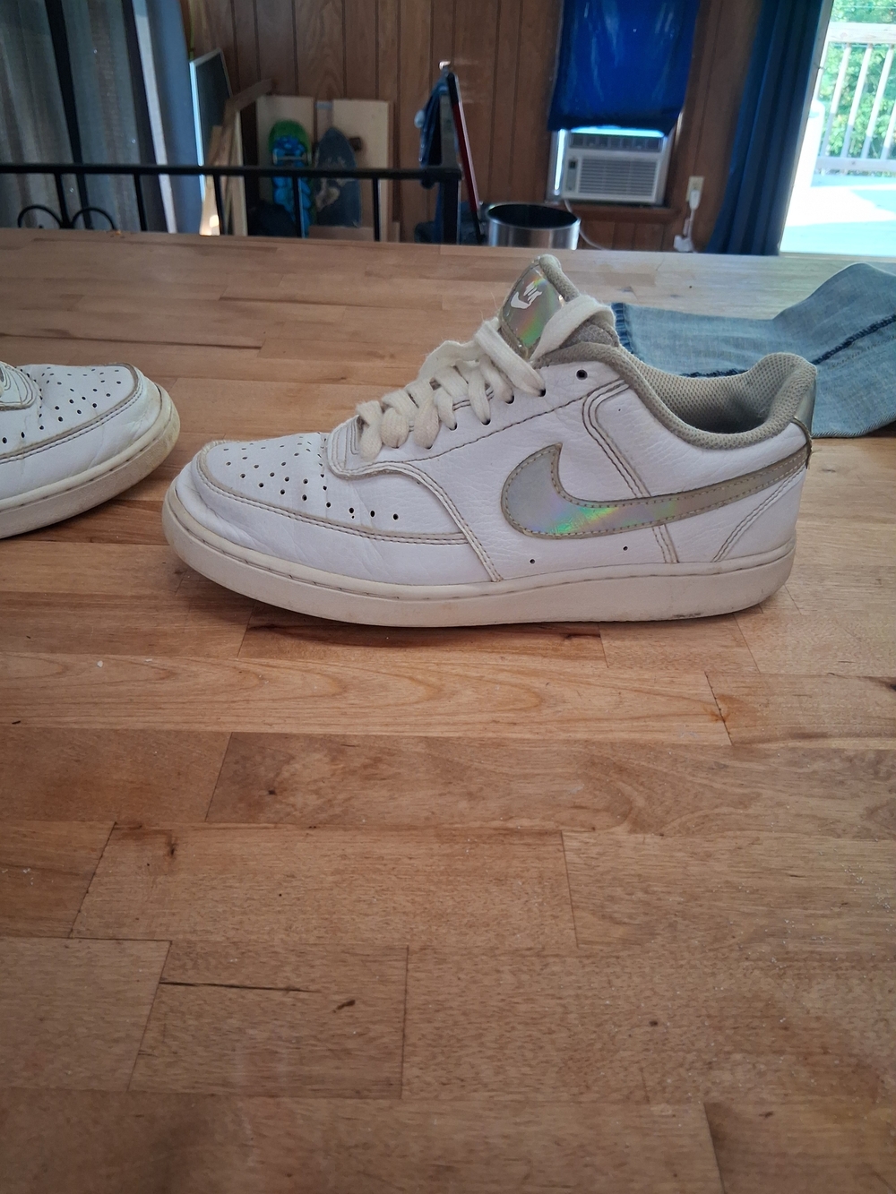 Nike White Low-Top Sneakers with Iridescent Swoosh Accent
